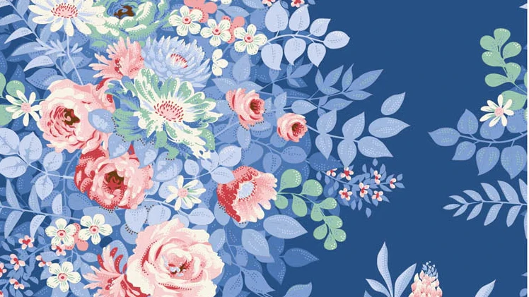 Tilda Something Blue Floral fabric pattern with pink and white flowers on a blue background, measured against a ruler.
