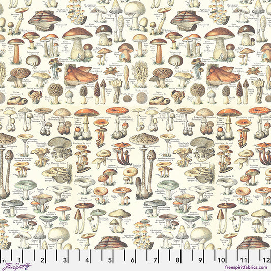 Orange Toadstools fabric in Orange by Tim Holtz for FreeSpirit